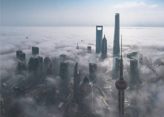 Shanghai in de mist van bovenaf | Behang